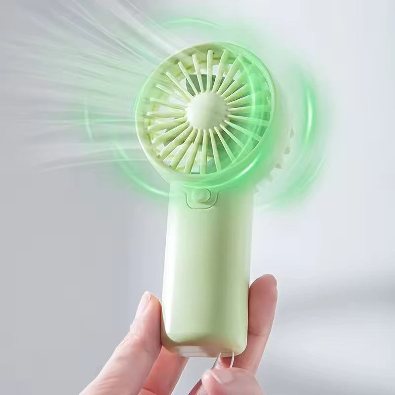 Portable Mini Handheld Fan – Lightweight, Adjustable & Cute Pocket Air Cooler
